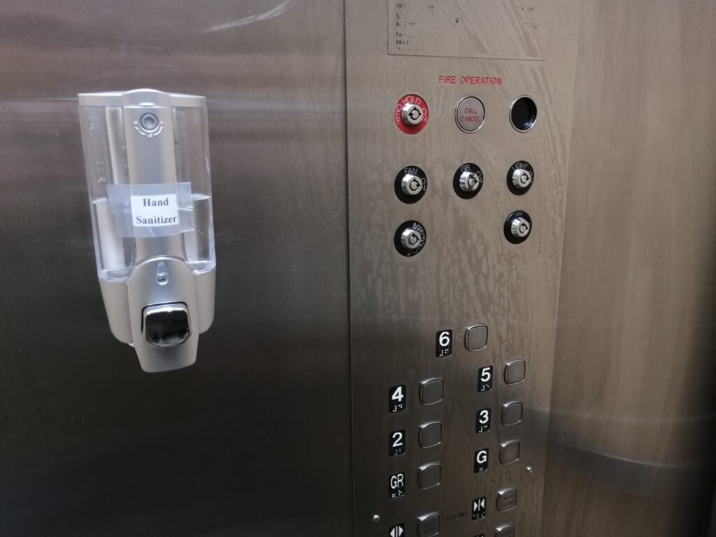 Hand sanitizers have been installed in elevators as well