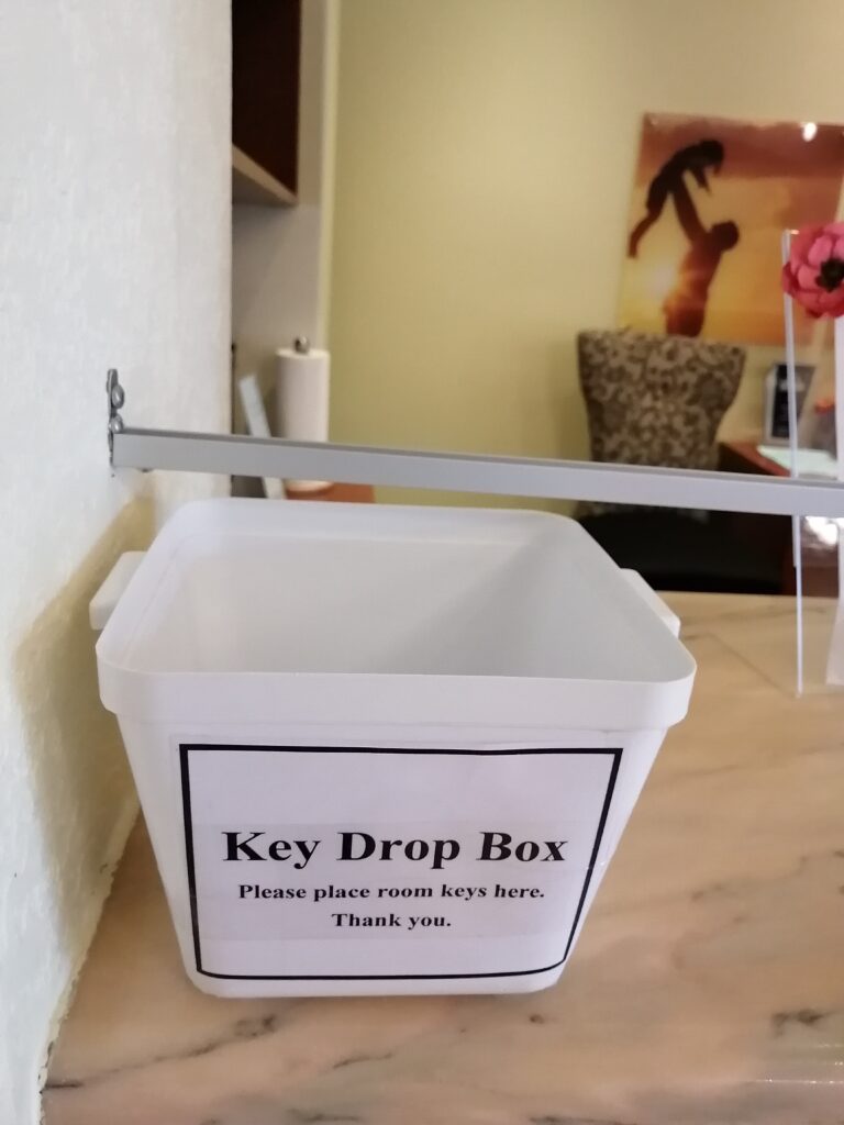 Instead of handing the card to a front desk agent, guests must drop the key in the key drop box
